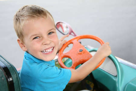 boy in toy carの写真素材