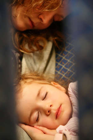 mother child airplane sleepの写真素材