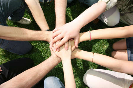 Friends have combined hands together