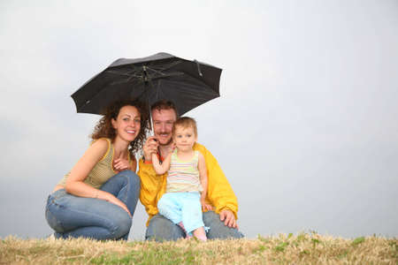 family with the umbrellaの写真素材