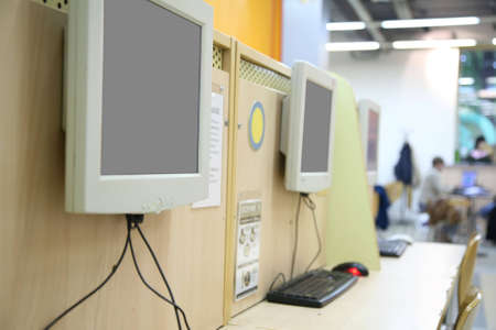 monitors in internet cafeの写真素材