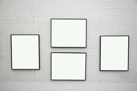 black frames on the white wallの写真素材