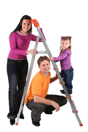 family with foldable ladder isolated on whiteの写真素材