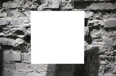 blank frame on grey brick wallの写真素材
