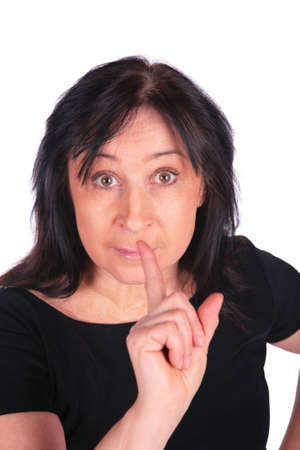 Woman in black gives gestureの写真素材