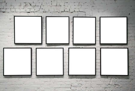 frames on white brick wallの写真素材