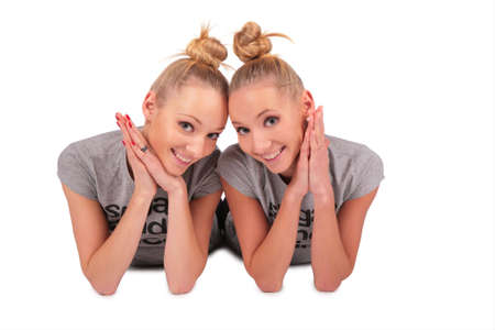 twin sport girls lying 3の写真素材