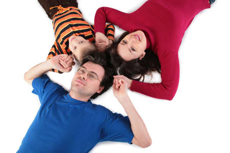 Parents with son lyingの写真素材