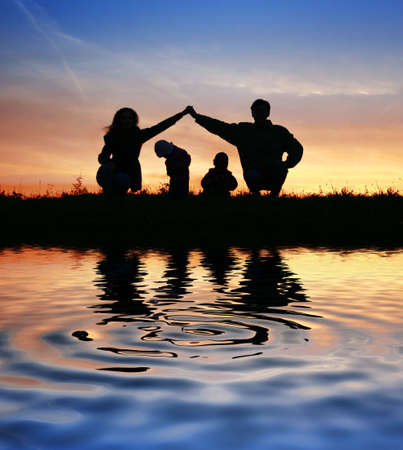 children in parents house on sky. waterの写真素材