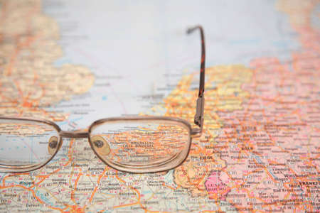 glasses on map of europeの写真素材