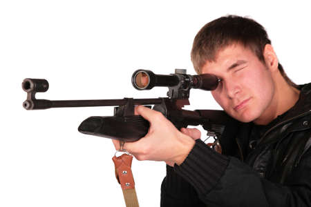 young man to aim from sniper gun