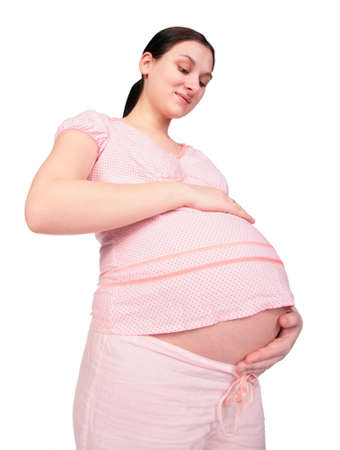 Pregnant girl touchs bellyの写真素材