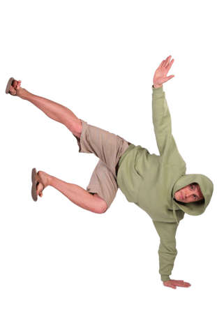 man stands on one hand