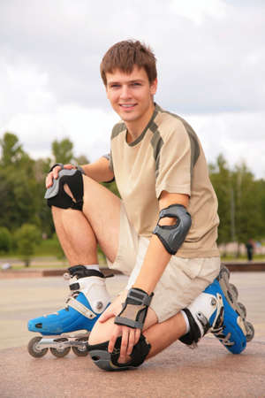 sitting Guy on roller skates