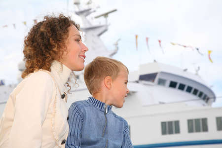 Mother, son and white shipの写真素材