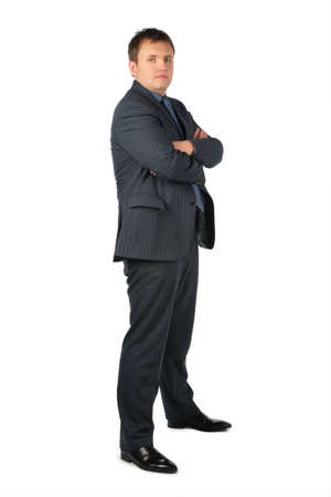 Man stands crossed hands on a chestの写真素材