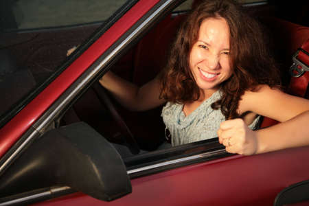 Woman in the red car