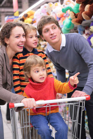 Parents with children in shopの写真素材