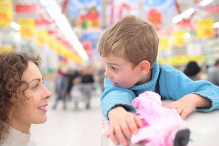 Mother and son in shopの写真素材