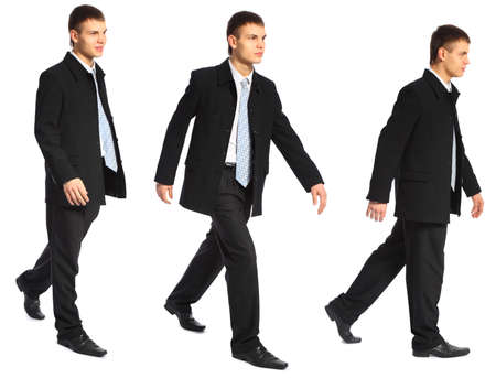 three young businessman walksの写真素材