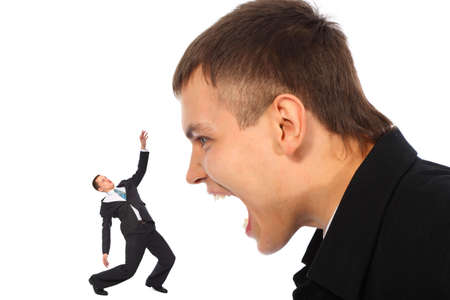 Young businessman shoutsの写真素材