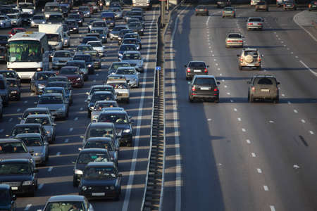 cars on highway, empty and full side