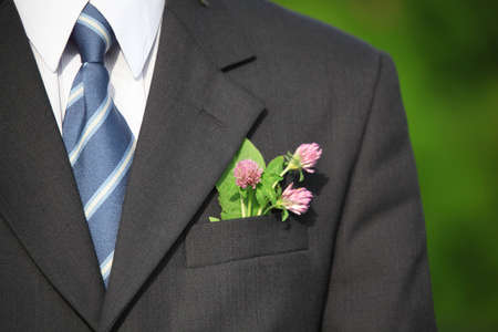 Flower in the pocket of suit