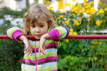 young girl has a rest in backyard