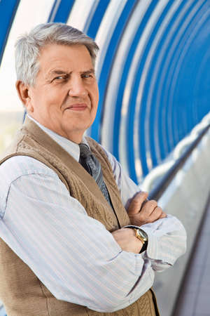 Senior man in the buildingの写真素材