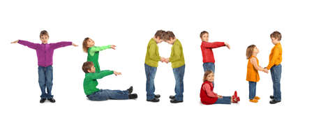 boy and girl making word TEACH, collageの写真素材