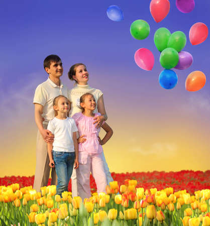family of four in tulip field and balloons collageの写真素材