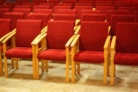 red wood chairs in auditoriumの写真素材