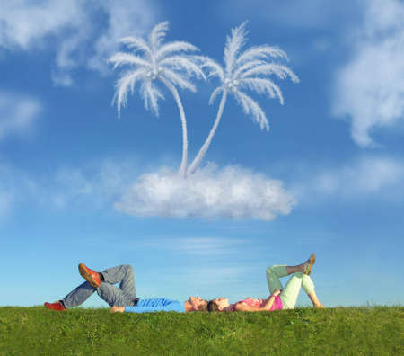 lying couple on grass and dream island collageの写真素材