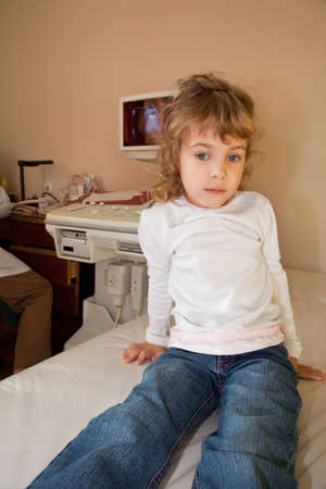 young girl have periodic survey health in medical office