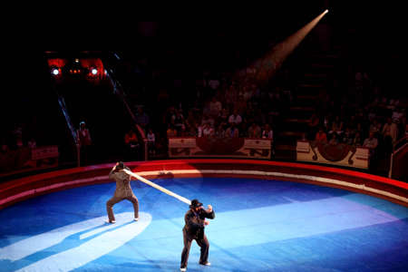 MOSCOW - JUNE 5 - blue arena in Moscow Nikulin circus performance with two weight lifters, June 5, 2010 in Moscow, Russiaのeditorial素材