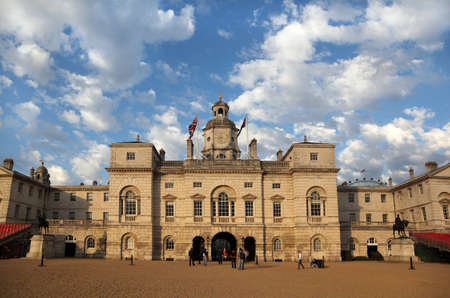 building of barracks of Royal Horse Guards in London. Tourists walk around itのeditorial素材