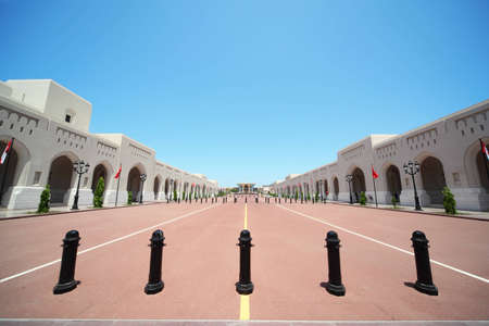 SULTANS PALACE IN OMAN - April, 14  Turkish and Oman flags on main avenue of Sultans Palace in time when Turkish leader was visited Oman benefit April 14, 2010 in Oman のeditorial素材