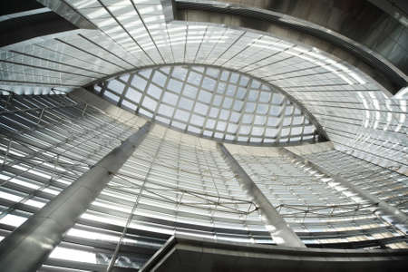 glass ceiling in public building with metal columns, abstract backgroundのeditorial素材