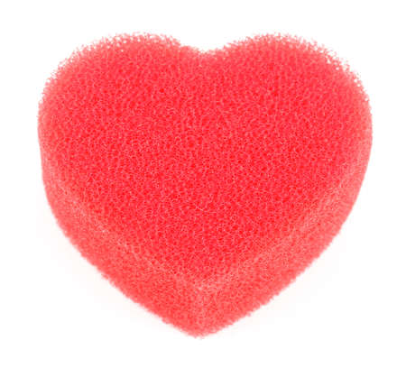 Sponge for shower in form of big red heart isolated on whiteの写真素材