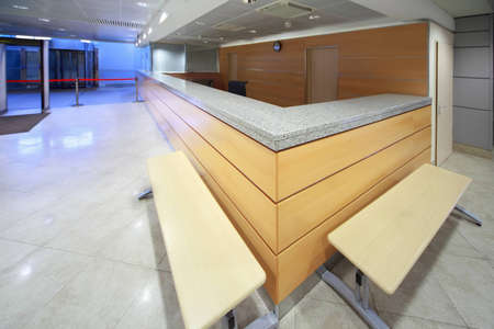 Reception desk on included in establishment, shallow depth of focus