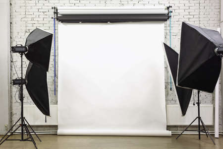 White background inside studio - light room with lamps and spotlights の写真素材
