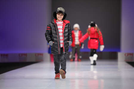 MOSCOW - FEBRUARY 22: Unidentified beautiful child models wear fashions from Snowimage and walk the catwalk in the Collection Premiere Moscow, main platform of fashion industry in Eastern Europe, on February 22, 2011 in Moscow, Russia.のeditorial素材