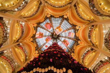 PARIS - DECEMBER 30: The Christmas tree at Galeries Lafayette, view from below, December 30, 2009, Pris, France. Galeries Lafayette is the most visited building in Paris after the Eiffel Tower.のeditorial素材