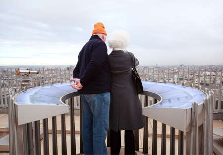 PARIS - JANUARY  2: Couple stands on Arc de Triomphe on January 2, 2010 in Paris, France. Annually...