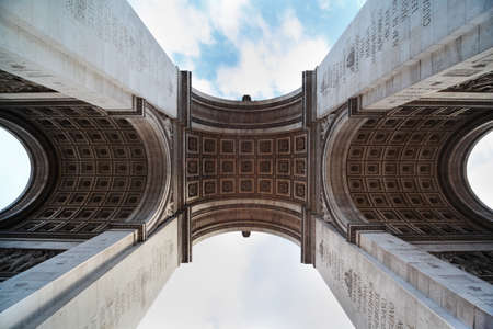 view of the Triumphal Arch from below in Paris, France, stucco の写真素材