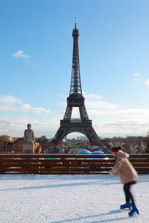 woman are skating, Eiffel Tower in winter at Paris, Franceの写真素材