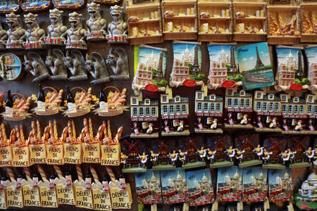 PARIS - JANUARY 3: Few rows of magnet souvenirs on January 3, 2010 in Paris, France. According Global Blue, Chinese, Russians, Indians and Brazilians more spend than other tourists in Parisのeditorial素材