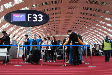 PARIS - JANUARY 5: Screening of passengers at the airport on January 5, 2010 in Paris. X-ray...
