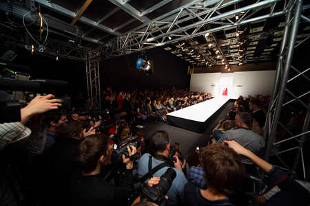 MOSCOW - OCTOBER 19: Two models go on catwalk at fashion show of clothes season SS 2011 at Russian...