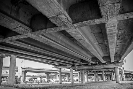 under the bridge. black and white.
